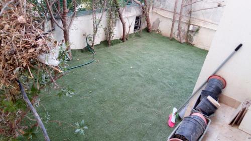 Κήπος έξω από το Happy House Ennasr