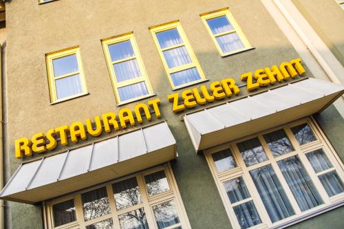 
a building with a sign on the side of it at Hotel Zeller Zehnt in Esslingen
