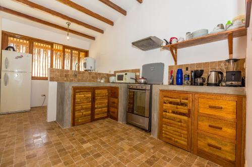 Η κουζίνα ή μικρή κουζίνα στο Penthouse Kahuna