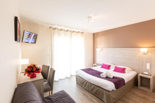 Cama o camas de una habitación en L'Oustal de Vézac