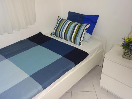 Ένα ή περισσότερα κρεβάτια σε δωμάτιο στο Apartmani DUNJA u GAJCU