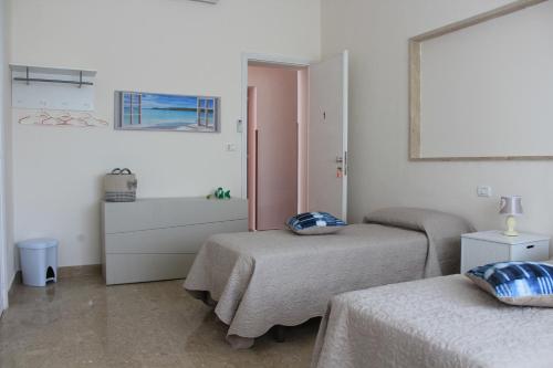 Voodi või voodid majutusasutuse Valderice Rio Apartments toas