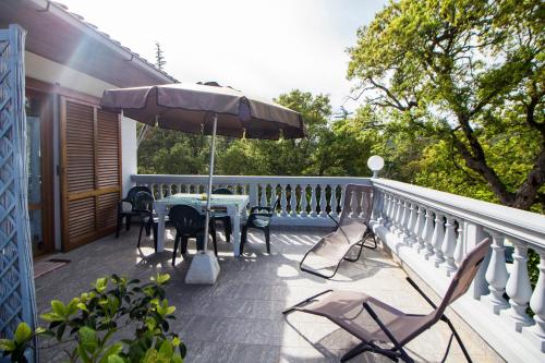 Balcon ou terrasse dans l'établissement Residence Oasis