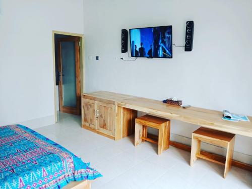 TV a/nebo společenská místnost v ubytování Dragonfly Hostel and Homestay