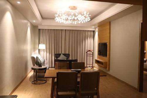 Coin salon dans l'établissement Kiranshree Grand
