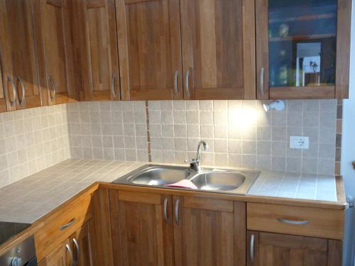 A kitchen or kitchenette at Casa Screm - Appartamenti e Camere