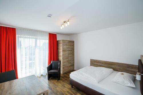 Postel nebo postele na pokoji v ubytování Come IN Hotel