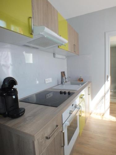 Una cocina o zona de cocina en Residence Mifaly