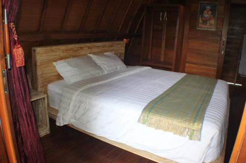 Кровать или кровати в номере Telagamas Guest House