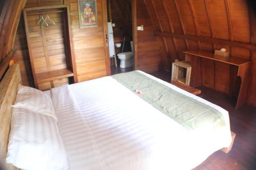 Кровать или кровати в номере Telagamas Guest House