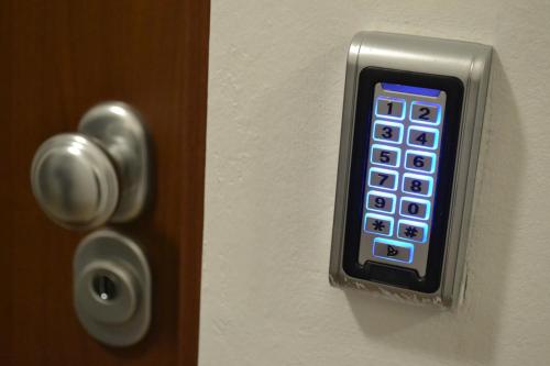 a close up of a door with a remote control at Fly Inn in Velika Gorica
