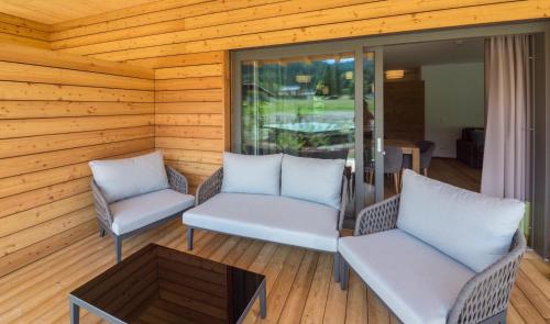 Posezení v ubytování Das Leonhard - Naturparkhotel am Weissensee