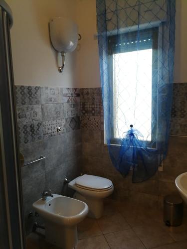 Ένα μπάνιο στο Mandriola Putzuidu Capo Mannu