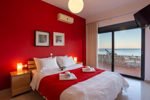 Tempat tidur dalam kamar di Caravella Luxury Apartments