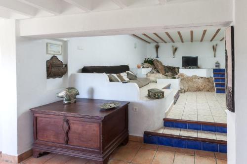En eller flere senger på et rom på Pedraviva