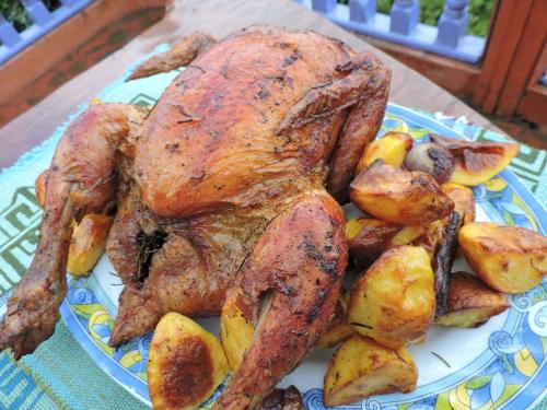a cooked turkey on a plate on a table at Joy Source Resort in Kathmandu