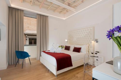 Postel nebo postele na pokoji v ubytování Hotel Navona