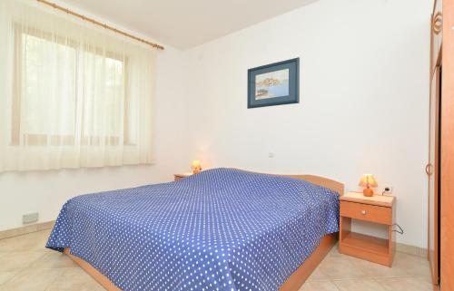 Postel nebo postele na pokoji v ubytování Apartments Denis 344