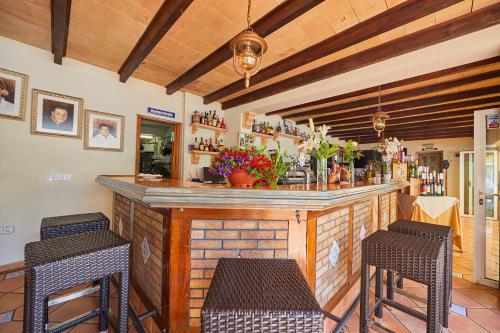 Un restaurante o sitio para comer en Hotel Cupidor
