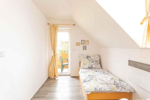 Postel nebo postele na pokoji v ubytování Apartmány Sen