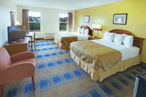 Katil atau katil-katil dalam bilik di St. Augustine Island Inn