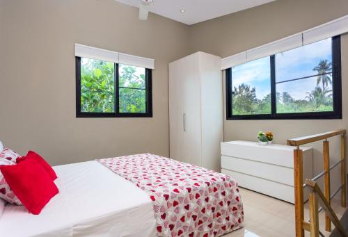 Postel nebo postele na pokoji v ubytování Residence Las Dos Palmas