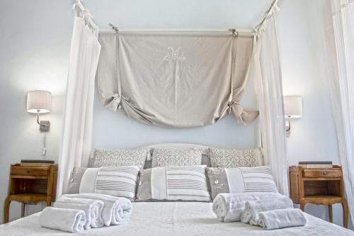 Кровать или кровати в номере Appartamenti Corte dell'Arancio