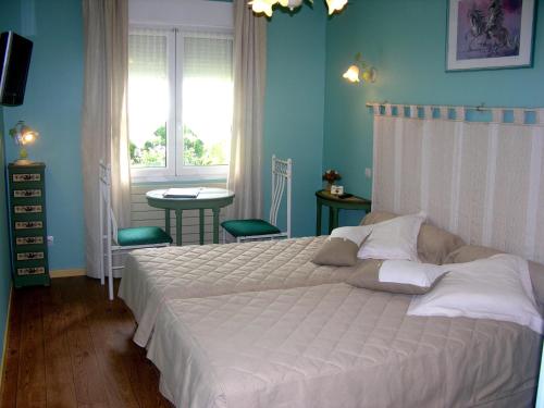 En eller flere senge i et værelse på Les Norias