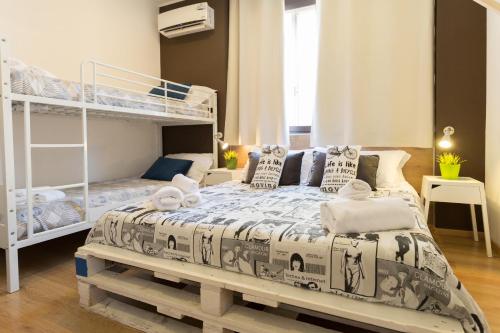 Ένα ή περισσότερα κρεβάτια σε δωμάτιο στο B&B Miro Centro Catania