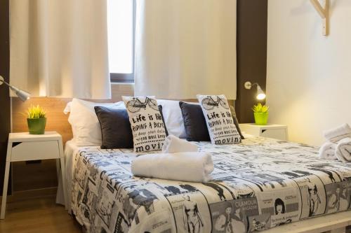 Ένα ή περισσότερα κρεβάτια σε δωμάτιο στο B&B Miro Centro Catania