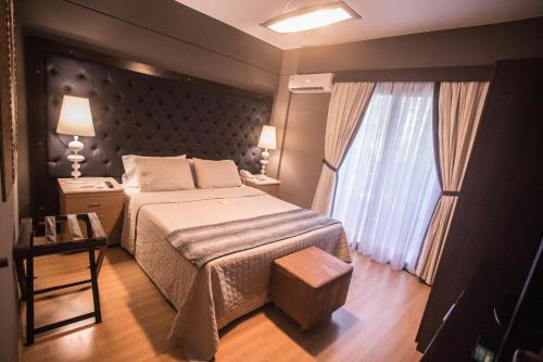 Postel nebo postele na pokoji v ubytování Las Ventanas Hotel Boutique