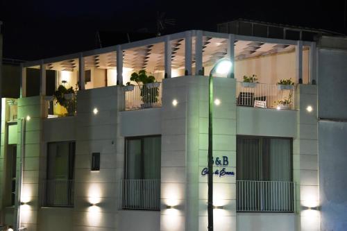 a building with a street light in front of it at B&B Casa di Emma in Porto Cesareo