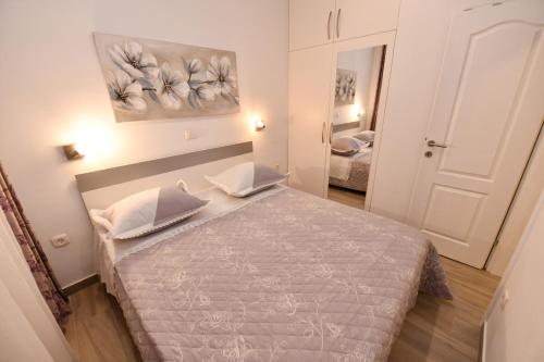 Ένα ή περισσότερα κρεβάτια σε δωμάτιο στο Apartment Cecilija