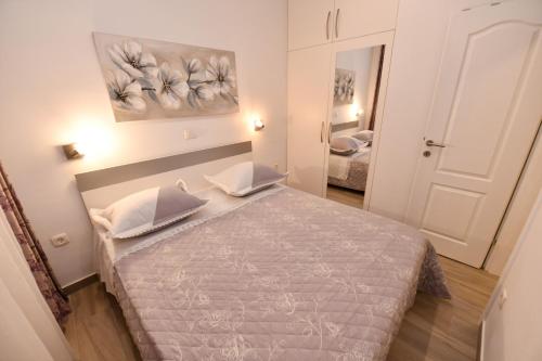 Postel nebo postele na pokoji v ubytování Apartment Cecilija