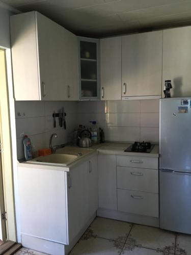 Una cocina o zona de cocina en Apartment Preila