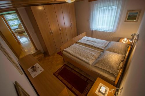 Postelja oz. postelje v sobi nastanitve apartma mojca