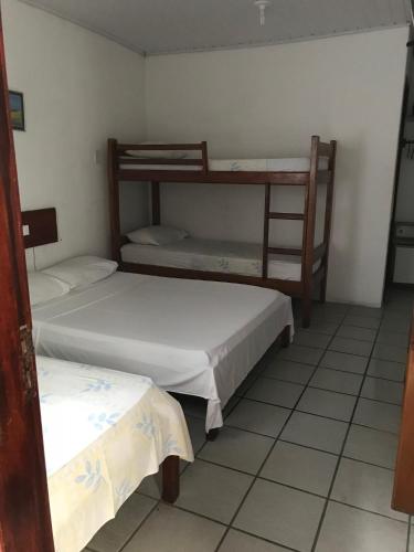 Hotel Pousada Hamburgoにあるベッド