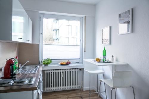 Η κουζίνα ή μικρή κουζίνα στο Apartments an der Universität