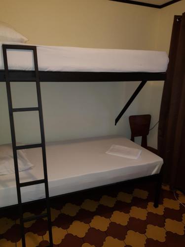 Postel nebo postele na pokoji v ubytování Hostel Dodero