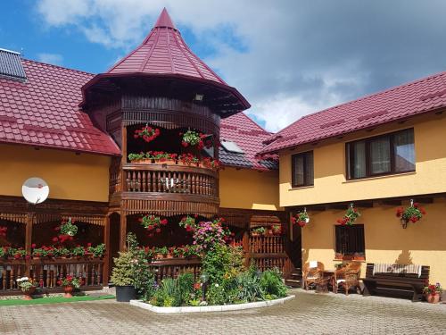 Imagem da galeria de Pensiunea Casa Cristina em Câmpulung Moldovenesc