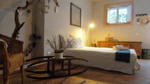 Ciglieri SantErmo Casciana Terme Lari tesisinde bir odada yatak veya yataklar