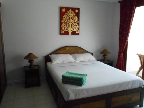 Cama o camas de una habitación en Papillon Residence