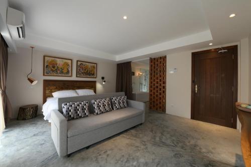 Postel nebo postele na pokoji v ubytování 38PC Boutique Hotel