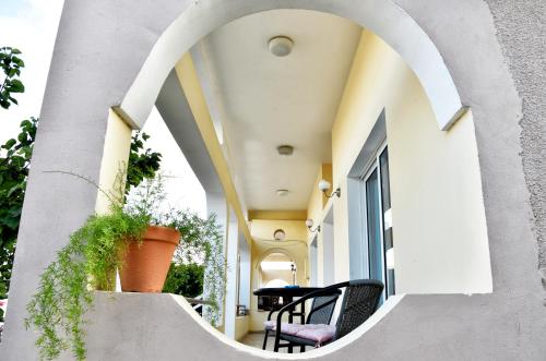 an internal courtyard of a house with a circular window at Lucky 4 in Paralimni
