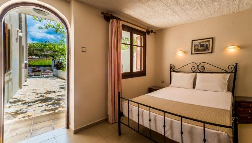 Кровать или кровати в номере Villa Merabello