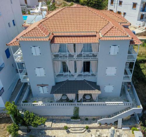an aerial view of a house with a tiled roof at Ikion Eco Boutique Hotel in Patitiri