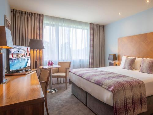 Voodi või voodid majutusasutuse The Connacht Hotel toas