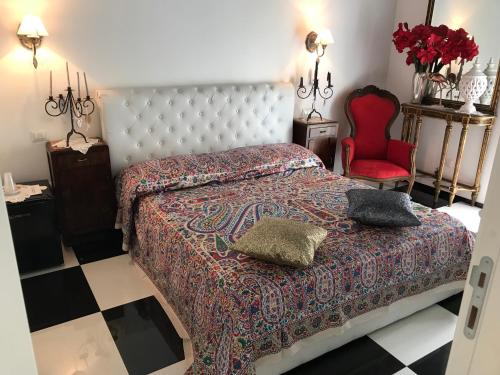 Katil atau katil-katil dalam bilik di B&B dell'orologio