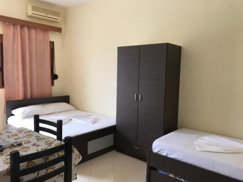 Katil atau katil-katil dalam bilik di Apartments Luis
