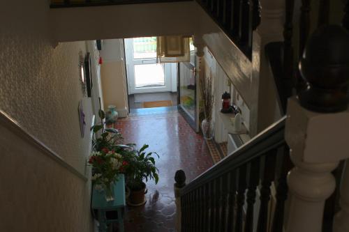 an overhead view of a hallway with a stairway at Sea Jade Guest House in Bude